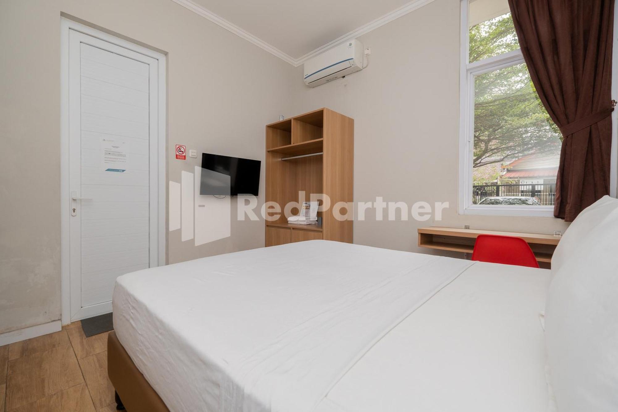 Palm Eight Mitra Reddoorz Hotel